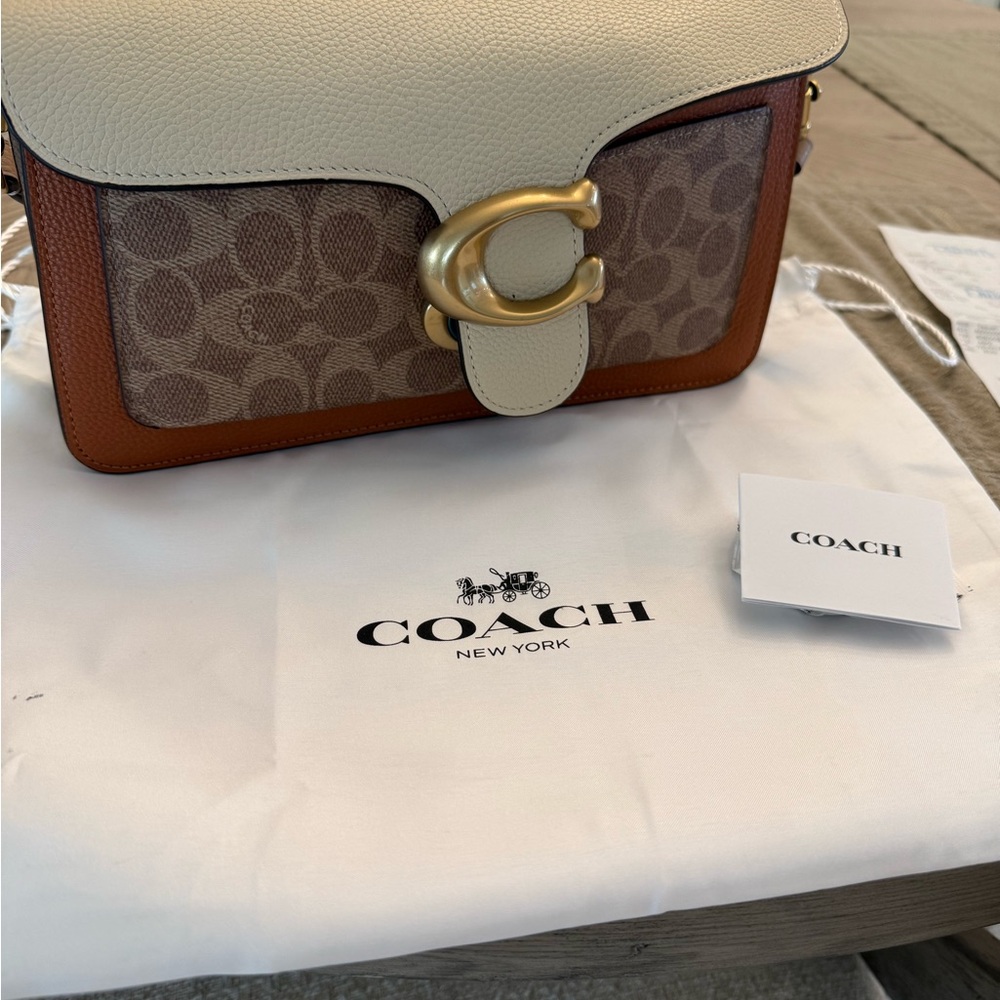 A Coach bag, new with tags, storage bag, shoulder strap